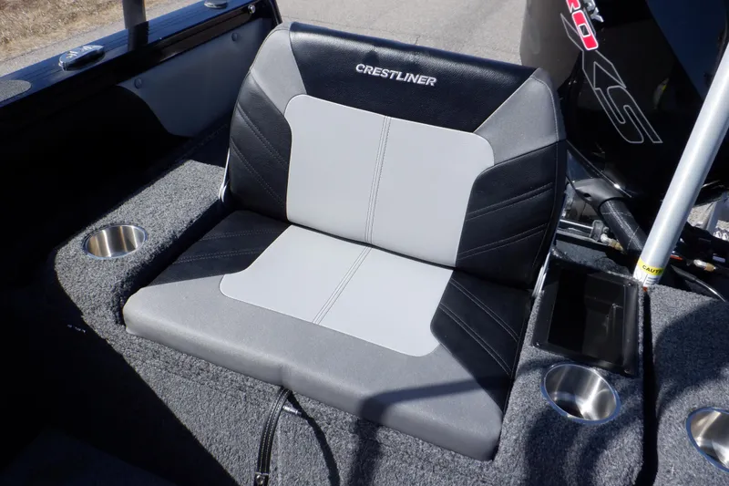 Slide: The Image of Crestliner 1950 Super Hawk 2022 boat seat with cup holders and sleek design. - 50