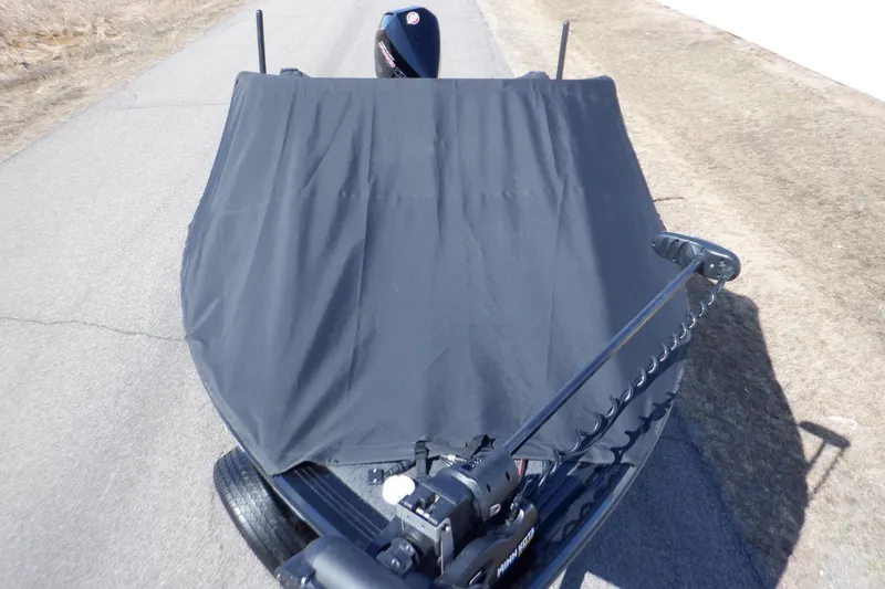 Slide: The Image of 2022 Crestliner 1950 Super Hawk boat with cover on a trailer, viewed from above. - 7