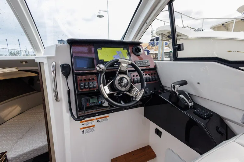 Slide: The Image of 2026 Solara S-250 Coupe cockpit with modern navigation and control systems, featuring sleek design. - 5