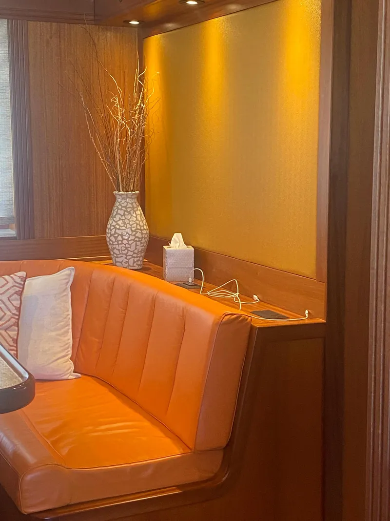 Slide: The Image of Luxurious Allseas Expedition- 2018 yacht interior with orange seating and elegant decor. - 31