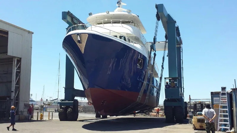 Slide: The Image of Allseas Expedition yacht 2018 in shipyard, lifted by crane for maintenance. - 4