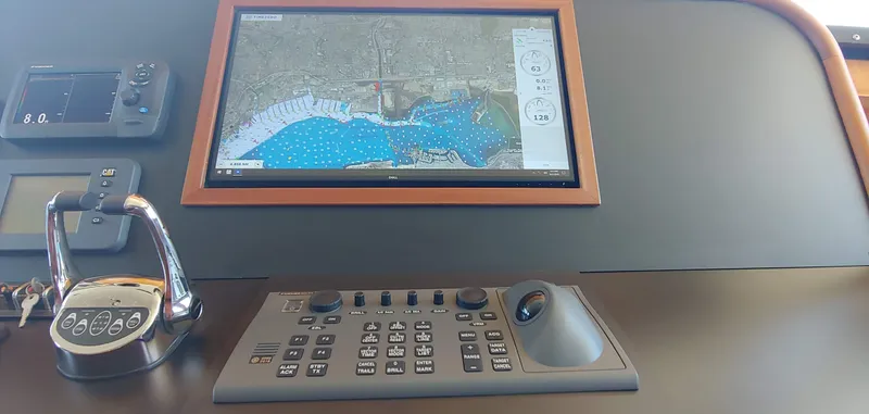 Slide: The Image of Allseas Expedition-2018 yacht navigation system with map display and control panel. - 41