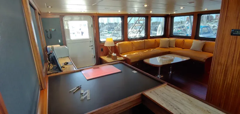 Slide: The Image of Luxurious Allseas Expedition yacht interior, 2018 model, featuring a cozy lounge and modern amenities. - 49