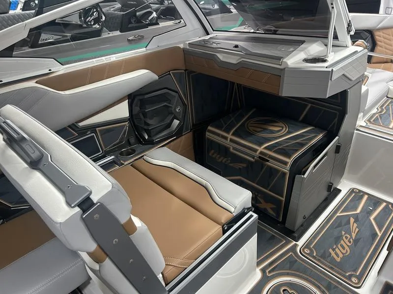 Slide: The Image of Interior of 2025 Tigé Ultré 23ZX boat with luxurious seating and modern design. - 3