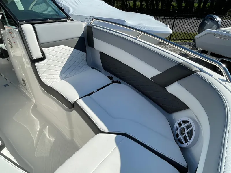 Slide: The Image of 2025 Chaparral 267 SSX boat interior with luxurious seating and modern design. - 10