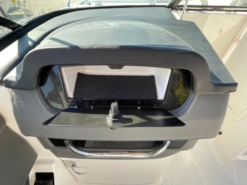 Slide: The Image of 2025 Chaparral 267 SSX dashboard with modern design and controls. - 23