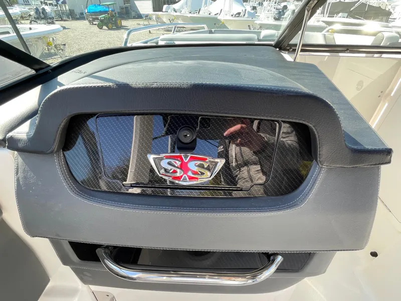 Slide: The Image of Dashboard of 2025 Chaparral 267 SSX boat with SSX emblem. - 22