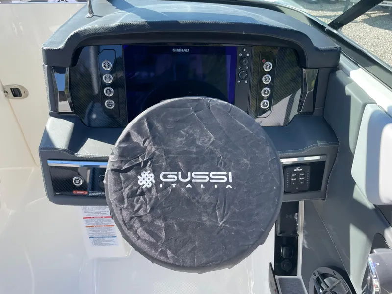 Slide: The Image of 2025 Chaparral 267 SSX dashboard with Gussi Italia steering wheel cover. - 36