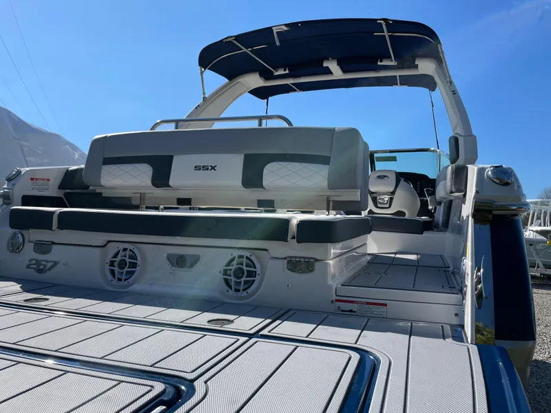 Slide: The Image of 2025 Chaparral 267 SSX boat with spacious seating and modern design. - 6
