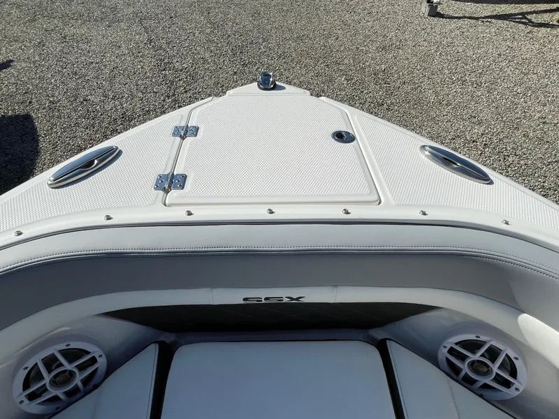 Slide: The Image of 2025 Chaparral 267 SSX boat bow with sleek design and modern features. - 8