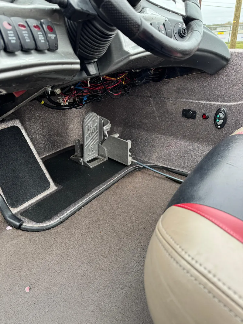 Slide: The Image of Interior view of 2012 Skeeter ZX 21 boat cockpit with steering and controls. - 4