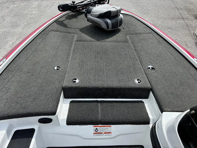 Slide: The Image of 2011 Nitro Z-8 boat deck with gray carpeting and mounted equipment. - 12