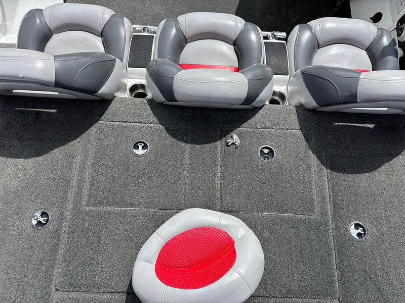 Slide: The Image of 2011 Nitro Z-8 boat interior with gray and red seating arrangement. - 15