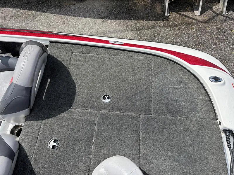 Slide: The Image of 2011 Nitro Z-8 boat deck with gray carpet and seating. - 19