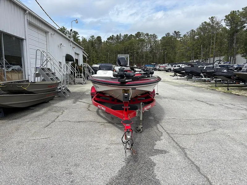 Slide: The Image of 2011 Nitro Z-8 boat on trailer in outdoor dealership lot. - 3