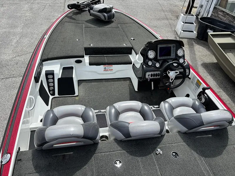 Slide: The Image of 2011 Nitro Z-8 boat interior with seating and control panel. - 9