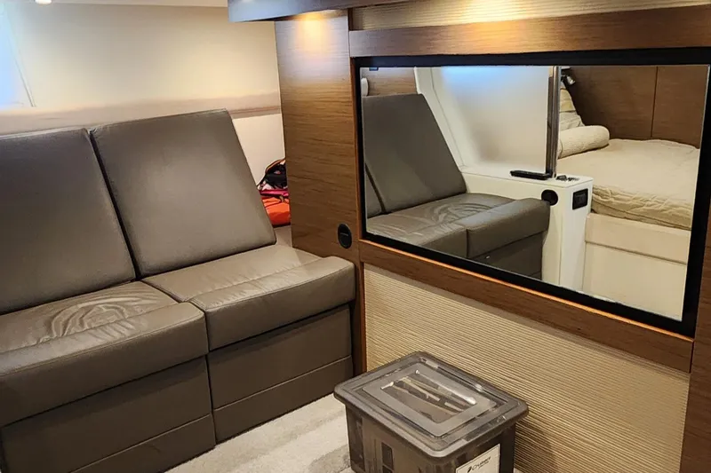 Slide: The Image of Luxurious interior of 2014 Cruisers Cantius yacht with leather seating and modern decor. - 28