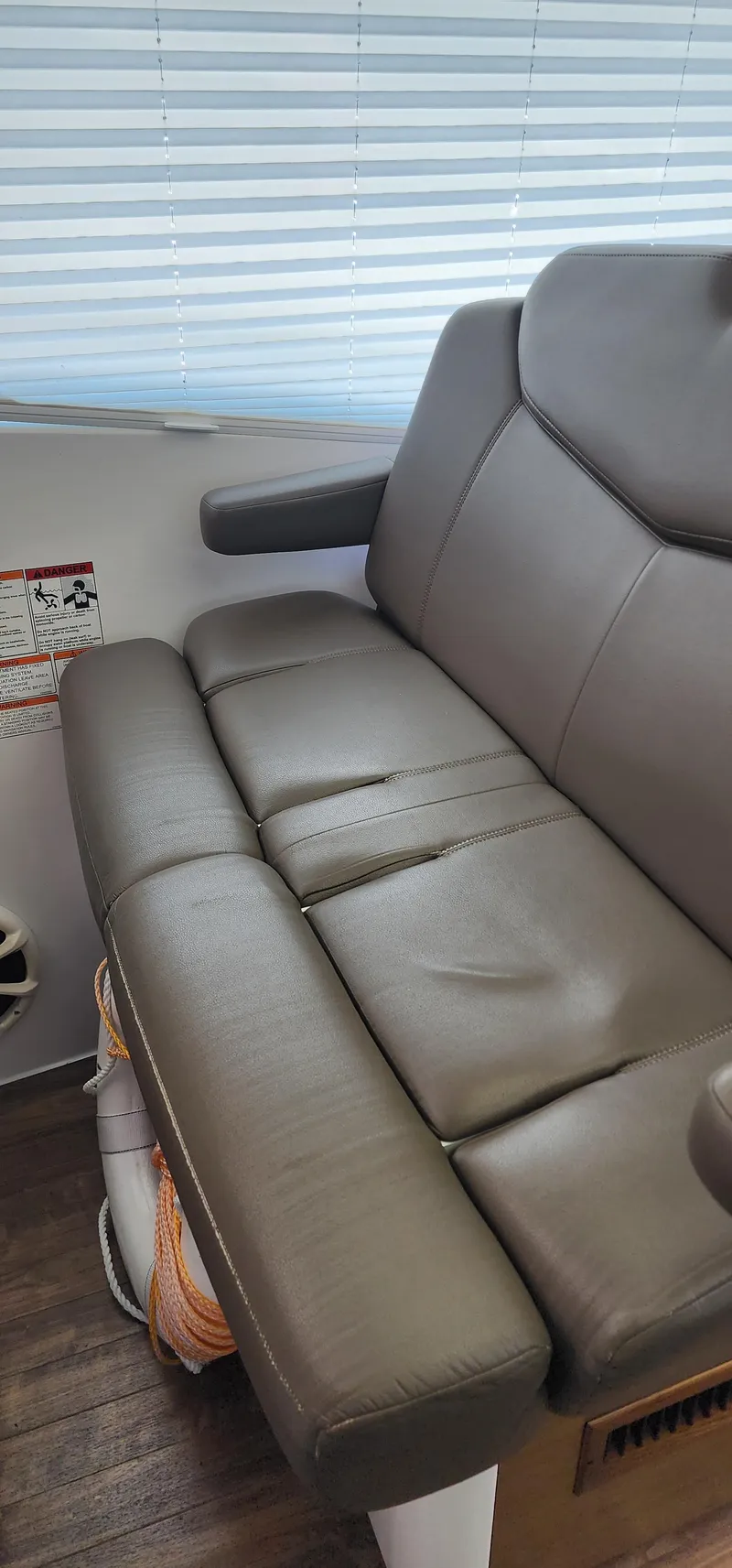 Slide: The Image of Luxurious leather seating in a 2014 Cruisers Cantius yacht interior. - 25