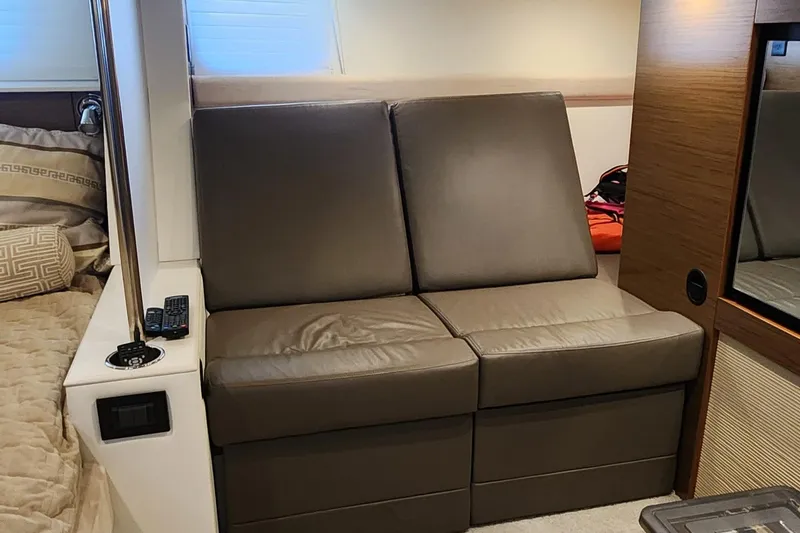 Slide: The Image of Interior of 2014 Cruisers Cantius yacht with leather seating and modern design elements. - 31