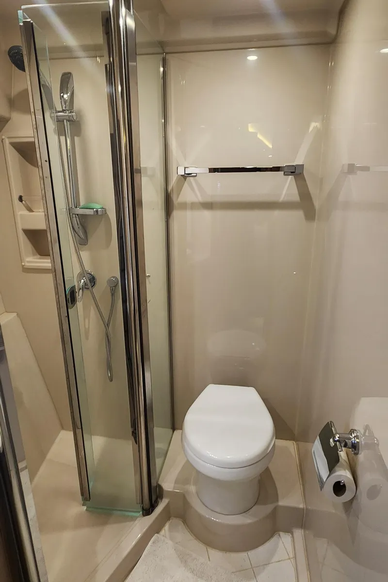 Slide: The Image of 2014 Cruisers Cantius bathroom with shower, toilet, and towel rack. - 39
