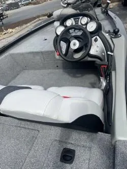 Slide: The Image of 2017 Tracker 175 Pro Team boat interior with steering wheel and gauges. - 4