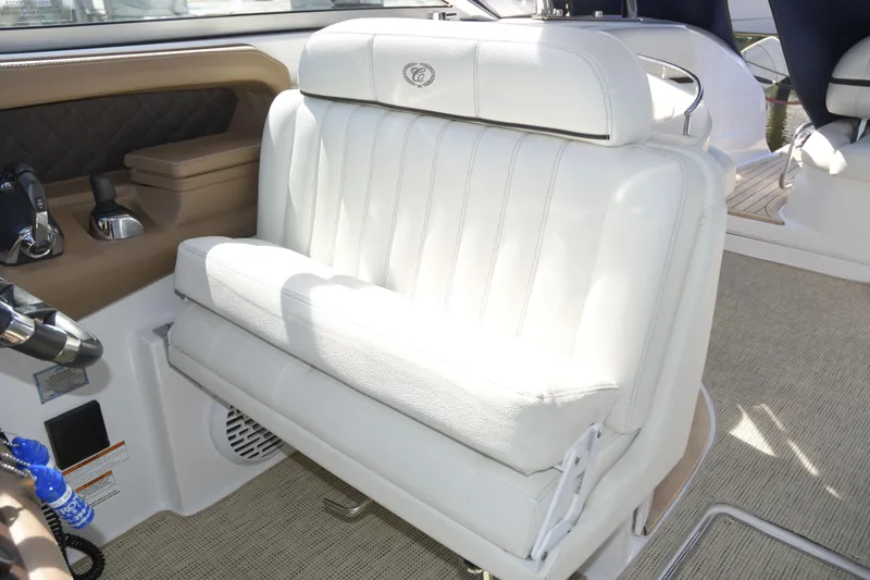 Slide: The Image of Luxurious white leather seating in a 2018 Cobalt R35 boat interior. - 13