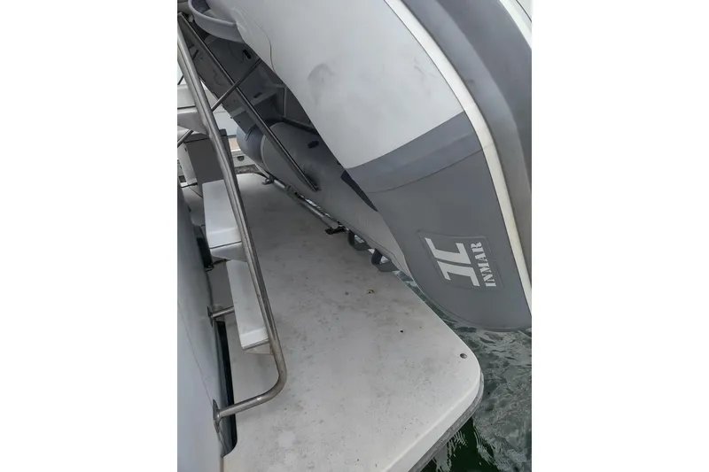 Slide: The Image of 1992 Carver 33 Aft Cabin Motor Yacht with Inmar inflatable boat on deck. - 43