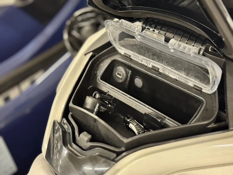 Slide: The Image of 2023 Sea-Doo GTX LTD 300 storage compartment with open lid, showcasing interior features. - 14