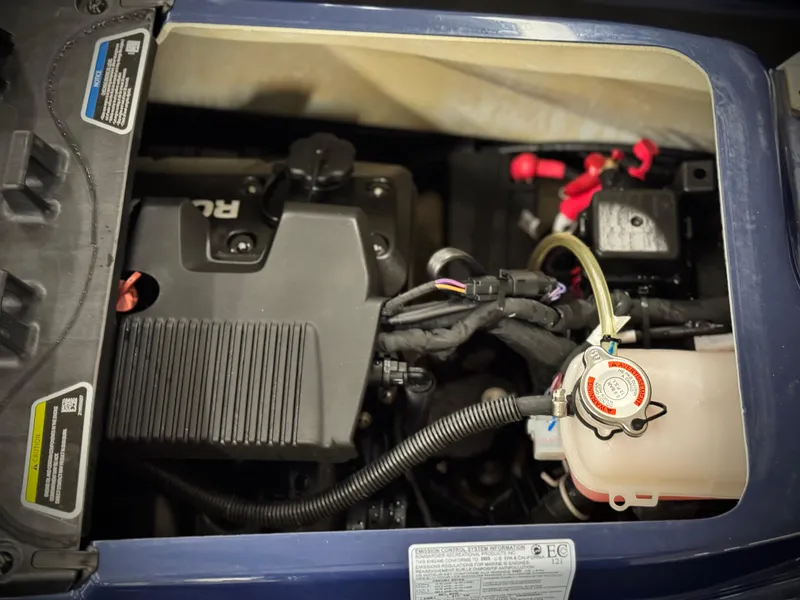 Slide: The Image of 2023 Sea-Doo GTX LTD 300 engine compartment, showcasing internal components and wiring. - 15