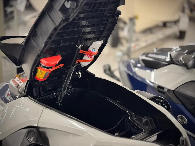 Slide: The Image of 2023 Sea-Doo GTX LTD 300 storage compartment open, showcasing interior space and accessories. - 29