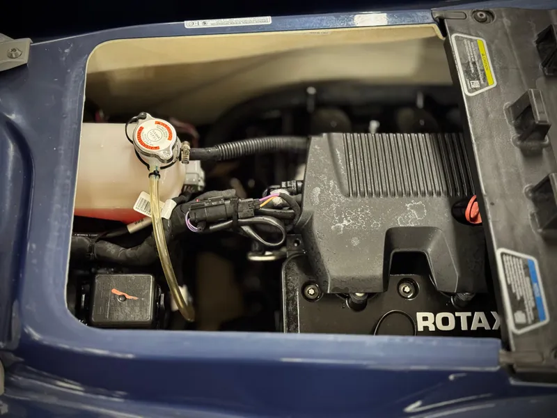 Slide: The Image of 2023 Sea-Doo GTX LTD 300 engine compartment with Rotax engine components. - 31