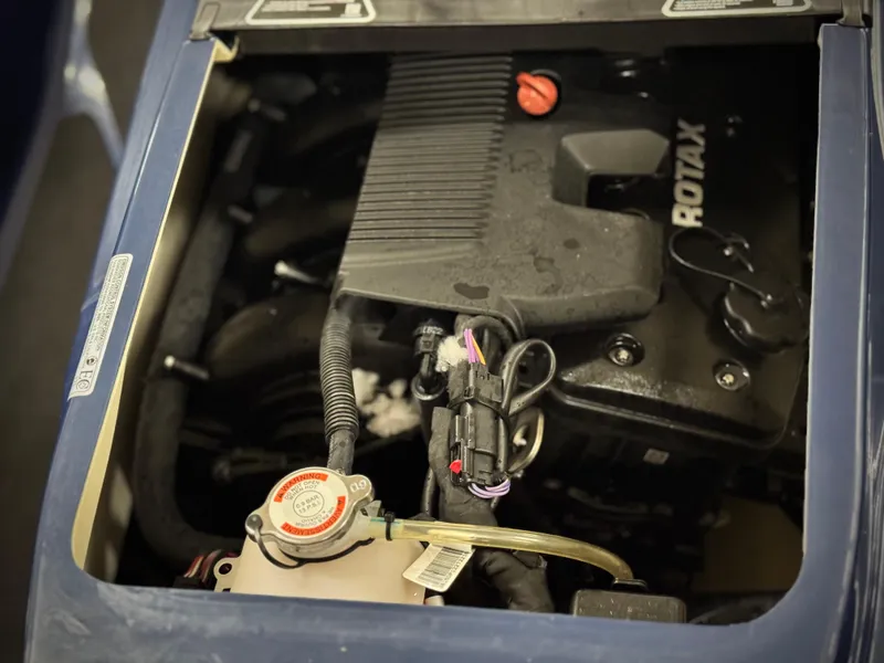 Slide: The Image of 2023 Sea-Doo GTX LTD 300 engine compartment with visible Rotax engine components. - 32