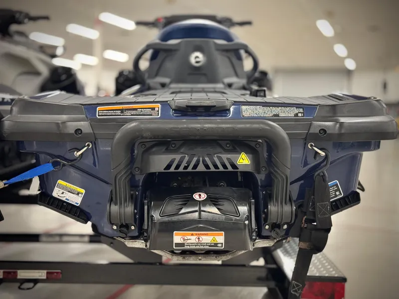 Slide: The Image of 2023 Sea-Doo GTX LTD 300 jet ski rear view in showroom. - 4