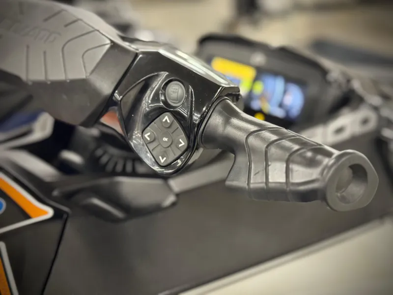 Slide: The Image of 2023 Sea-Doo GTX LTD 300 handlebar with control buttons, close-up view. - 8
