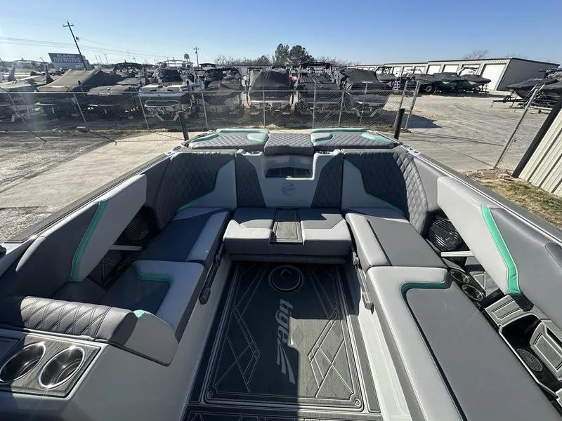 Slide: The Image of 2025 Tigé 24RZX boat interior with spacious seating and modern design. - 5