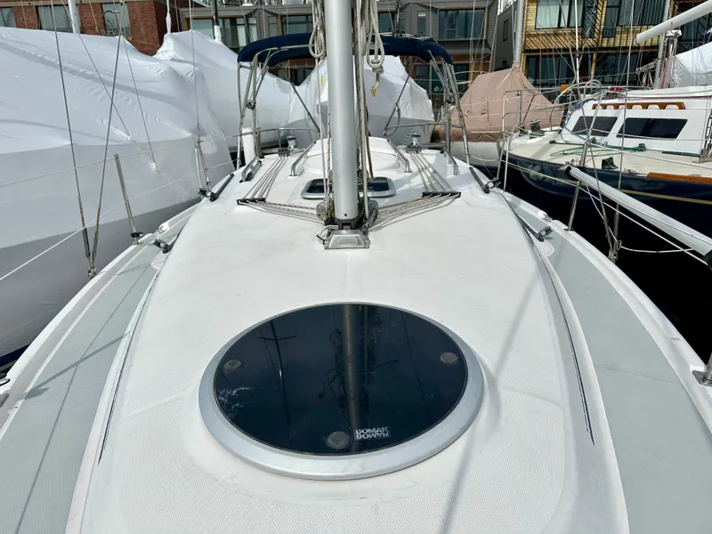 Slide: The Image of Bow of a 2006 Hunter 31 sailboat with stainless steel railings. - 14