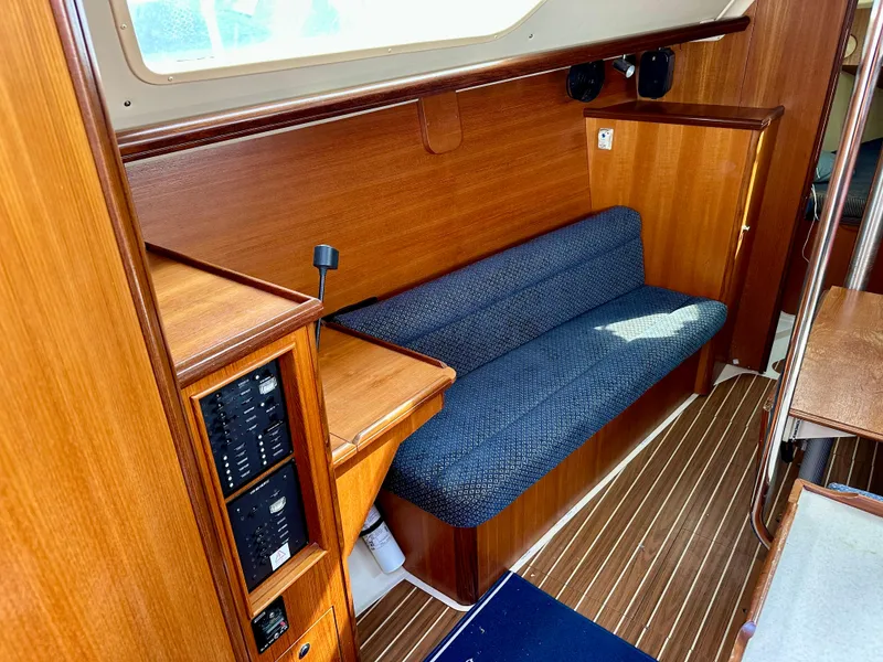 Slide: The Image of Compact bathroom in a 2006 Hunter 31 sailboat with sink, countertop, and toilet. - 28
