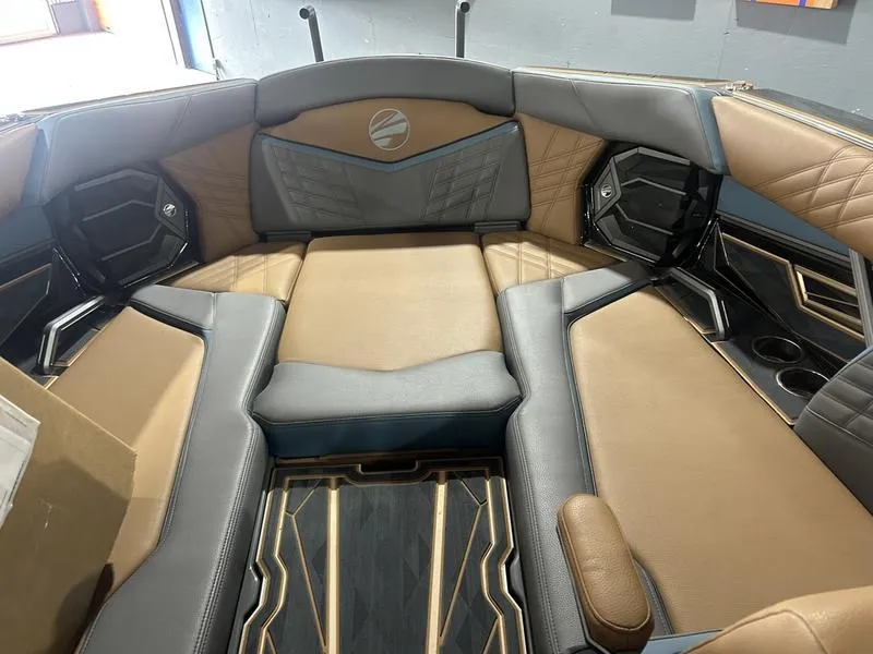 Slide: The Image of Interior of 2025 Tigé Ultré 25ZX boat with luxurious seating and modern design. - 4
