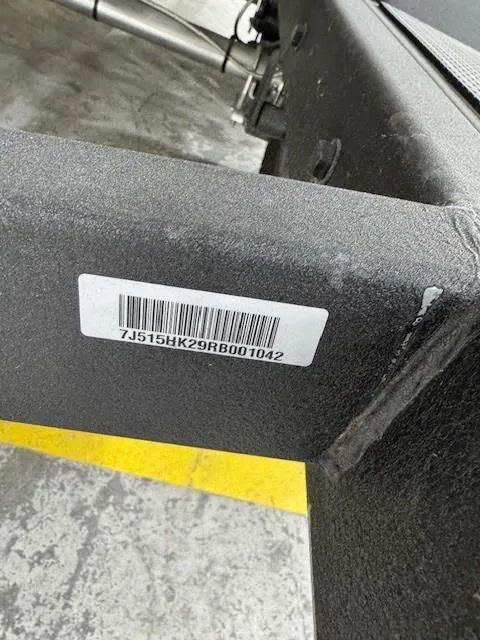 Slide: The Image of 2024 Tahoe 210 S boat trailer with visible barcode and serial number. - 10