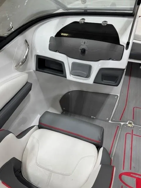 Slide: The Image of 2024 Tahoe 210 S boat interior with modern dashboard and seating. - 5