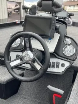 Slide: The Image of 2020 Ranger RT198P boat dashboard with steering wheel and Garmin display. - 3