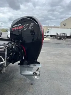 Slide: The Image of 2020 Ranger RT198P boat with Mercury Pro XS outboard motor in a parking lot. - 7