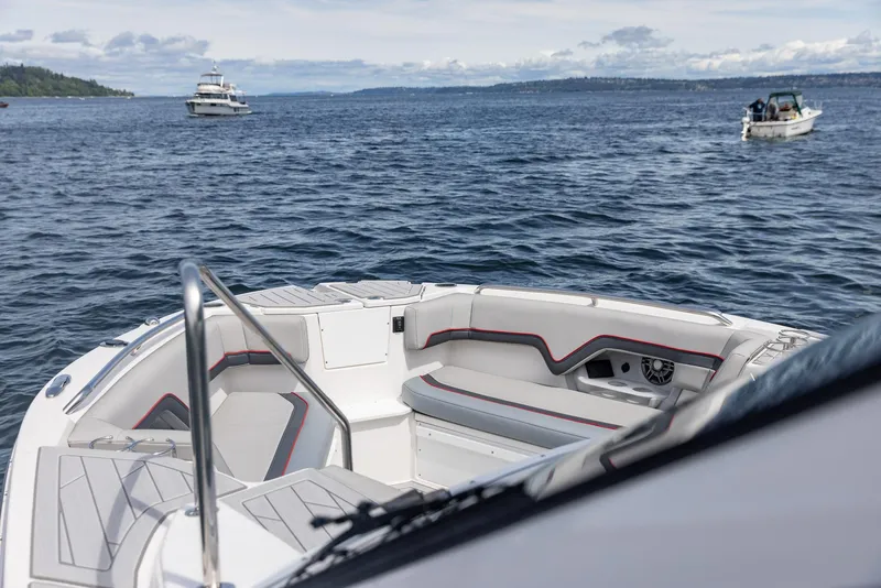 Slide: The Image of Bow view of 2026 Solara S-310 CW boat on open water. - 12