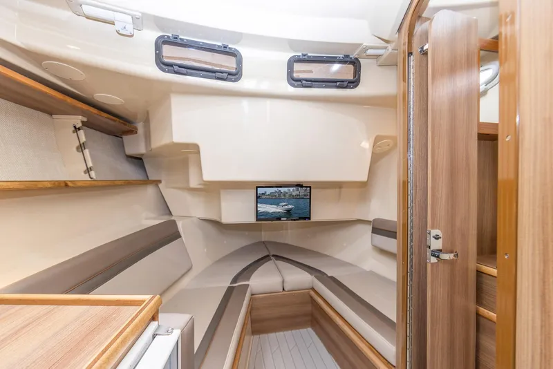 Slide: The Image of 2026 Solara S-310 CW cabin interior with modern design and wood accents. - 26