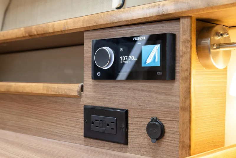 Slide: The Image of 2026 Solara S-310 CW interior with Fusion audio system and power outlet. - 29