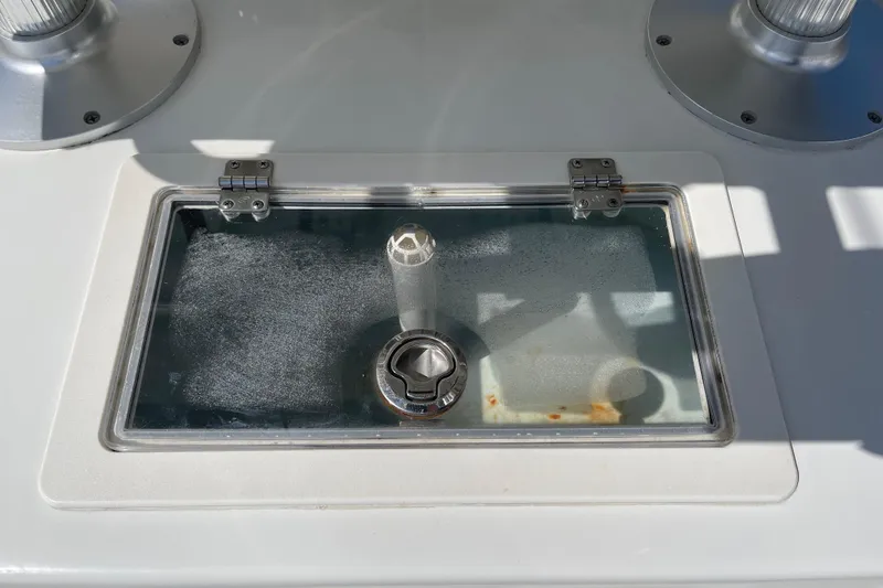 Slide: The Image of Livewell compartment on a 2016 Parker 2501 Center Console boat. - 13