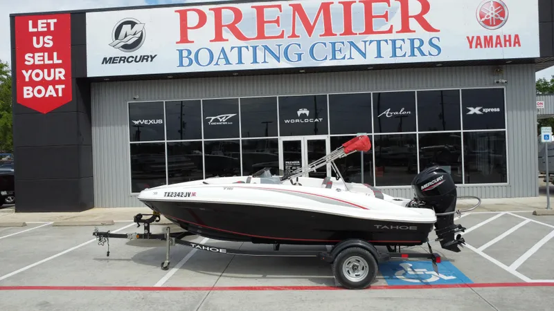 Slide: The Image of 2021 TAHOE TAHT16 boat on trailer at Premier Boating Centers dealership. - 1