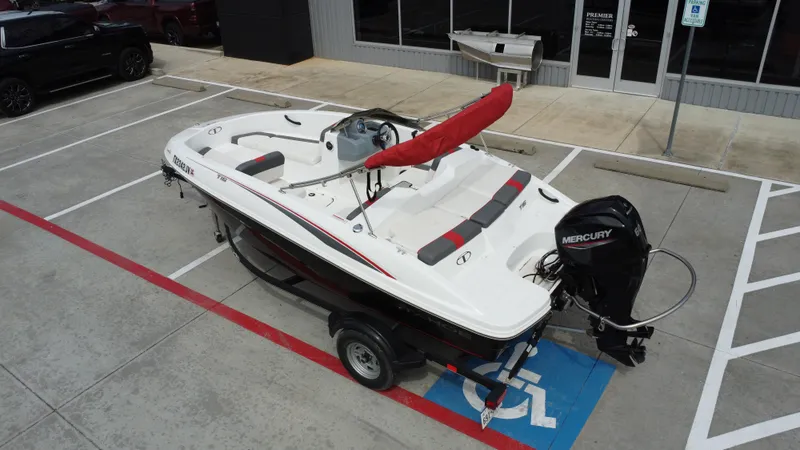 Slide: The Image of 2021 TAHOE TAHT16 boat with Mercury engine parked in a lot. - 17