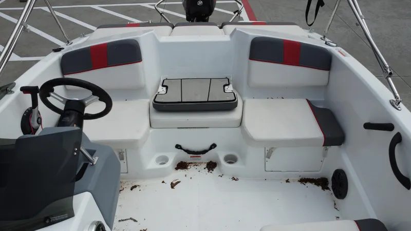 Slide: The Image of Interior of 2021 TAHOE TAHT16 boat with seating and steering wheel. - 21