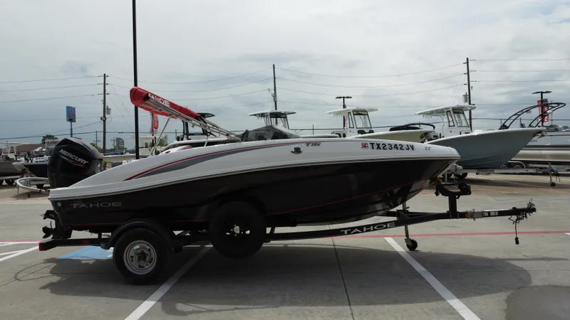 Slide: The Image of 2021 TAHOE TAHT16 boat on trailer in outdoor dealership lot. - 5